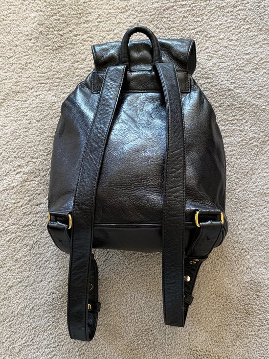 Vtg DKNY Donna Karan Leather Bagpack/ bag Women\'s Black Drawstring gold logo Y2K